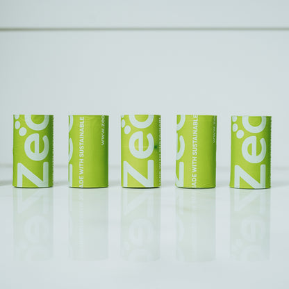 Image of bright green dog bag rolls and Zeofill logo printed. 